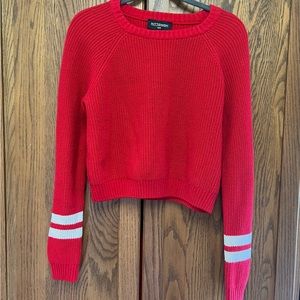 Red kittenish sweater